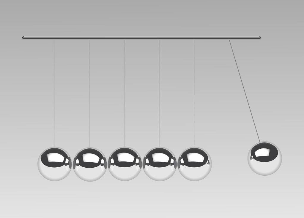 Descriptive image of a Newton's Cradle